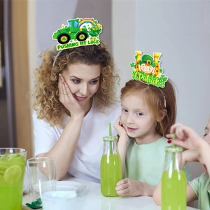 Adult and child wearing St. Patrick's Day headbands with rainbow and clover details