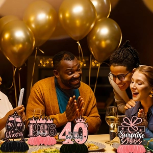 Detailed 40th birthday party tabletop honeycomb centerpieces in elegant pink and gold