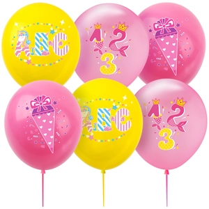Detail van roze en gele schoolfeestballonnen met eenhoorn- en zeemeerminprints voor kinderen