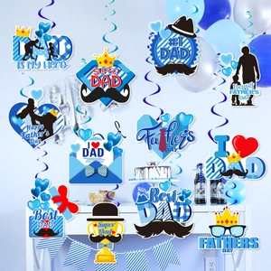 Hanging Father's Day decorations featuring blue tie, crown, and trophy swirl ornaments