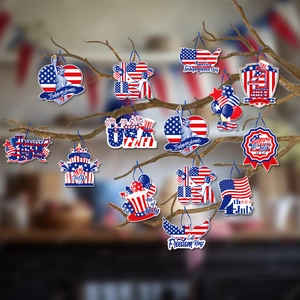 Detail of 4th of July hanging decorations on branches with vibrant patriotic designs