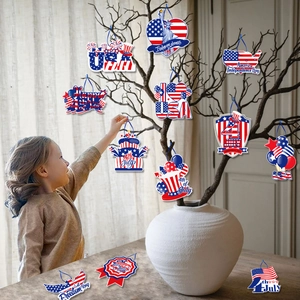USA Independence Day patriotic ornaments set with stars and stripes hanging on branches