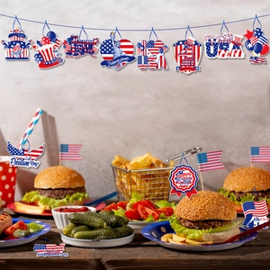 Detailed USA Independence Day party tags featuring festive patterns on a rustic wooden table