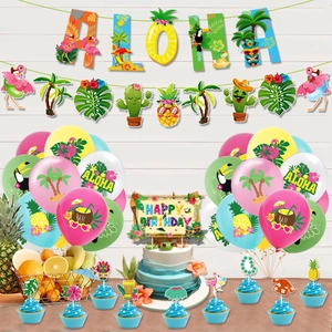 Tropical Aloha party set with flamingo banners, balloons, and pineapple cake toppers