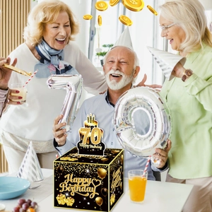 Scatola regalo a sorpresa per il 70° compleanno con decorazioni nere e oro eleganti