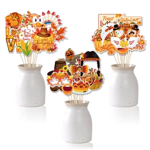 Thanksgiving party photo booth props with turkey pumpkin and maple leaf designs on sticks