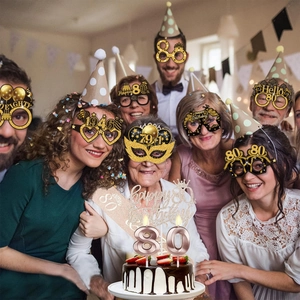 Family celebration scene showing 80th birthday party decorations and funny paper eyewear