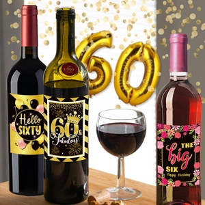 Detailed view of 60th birthday wine bottle labels with Hello Sixty and floral designs