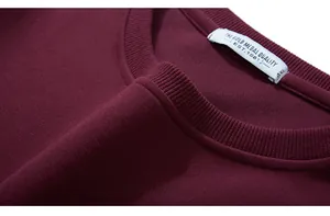 Detail of burgundy sweatshirt ribbed crew neck with reinforced stitching and 4XL label