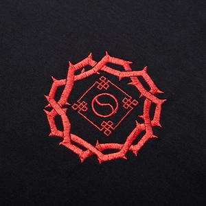 Black short sleeve T-shirt featuring intricate red Chinese knot embroidery and S-letter