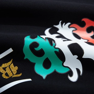 Oversized black hoodie featuring vibrant multi-color gothic lettering with gold glitter detail