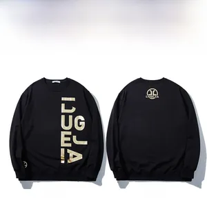 Close-up of black oversized sweatshirt with gold LUGEJA metallic foil print detailing