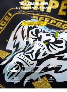 Macro shot of colorful animal print and golden lettering on black cotton sweatshirt