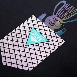Oversized black hoodie with colorful holographic rabbit print and pink diamond patterns