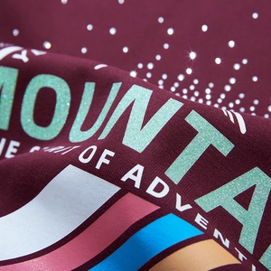 Burgundy oversized sweatshirt with mountain logo and glittering rhinestone design