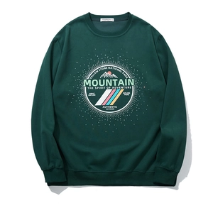 Green oversized sweatshirt featuring a Yellowstone National Park mountain print and ribbed cuffs