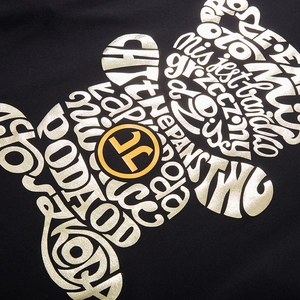 Sweat-shirt noir oversize avec motif d'ours en peluche doré et lettrage artistique chic
