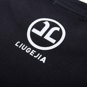 Men's oversized black cotton hoodie with a white circular logo and brand letter print