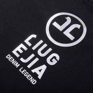Oversized black sweatshirt featuring silver metallic denim legend graphic print