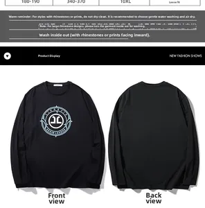 Close-up of graphic letter print and compass design on black oversized long sleeve t-shirt
