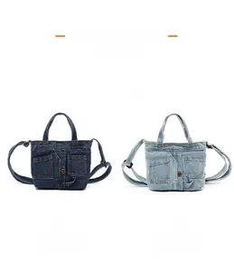 Dark blue and light blue denim crossbody bags with front pockets and adjustable straps