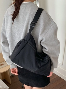 Minimalist black large capacity crossbody tote bag for commuting with adjustable strap