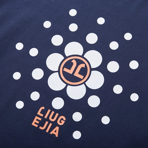 Navy blue oversized knit long sleeve tee with white graphic print and orange logo detail