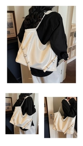 Détail du grand cabas blanc crème avec boucle argentée ajustable et fini brillant
