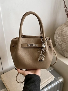 Chic coffee litchi grain leather bucket bag with metal lock and fashion charm