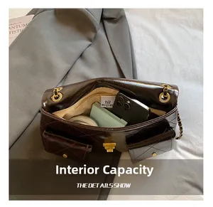 Internal capacity of the quilted brown leather tote bag showing space for daily items