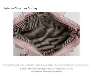 Top view of pink tote bag interior showing brown striped lining and zipper pocket