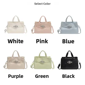 Collection de sacs à main en cuir en six couleurs avec détail de fermoir rotatif