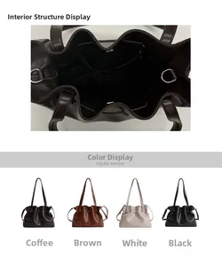 Detail view of ruched leather tote showing magnetic closure and interior pocket details