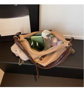 Top view showing the spacious interior compartment of the large two-tone leather tote bag