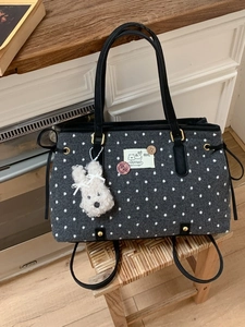Chic black polka dot felt tote bag with cute dog patch and white rabbit charm