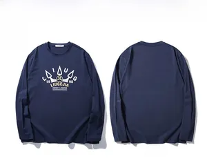 Flat lay view of navy blue long sleeve t-shirt showing front and back graphic prints