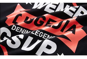 Macro detail of high-quality rubberized print on black streetwear long sleeve cotton t-shirt