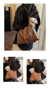 Brown vintage tote bag featuring gold chain strap and a cute beige plush rabbit charm