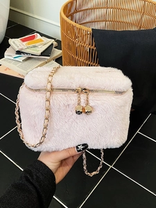 Pink faux fur mini box bag with chain strap and rhinestone dice zipper pulls