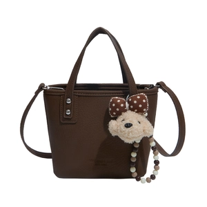 Sac seau rétro en cuir marron café avec poignées et un charmant ours en peluche