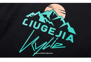 Detailed close-up of mountain print and typography on black cotton long sleeve T-shirt