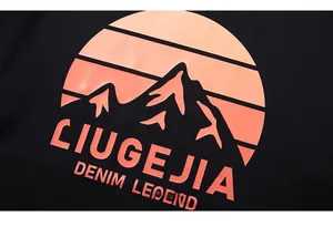 Detailed view of sunset mountain graphic print on black long sleeve cotton T-shirt