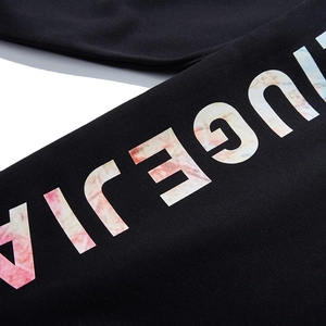 Oversized black sweatshirt featuring colorful marble texture letter prints on the side
