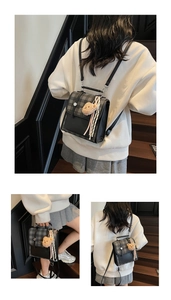 Detail of plaid backpack showing crossbody and handheld styles with bear pendant