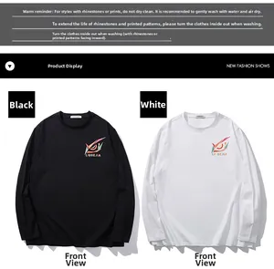 Flat lay of black and white long sleeve t-shirts with abstract eye print and lettering