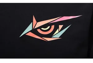 Macro shot of colorful geometric eye print and LIUGEJIA text on black cotton shirt
