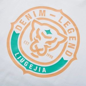 White long-sleeve cotton T-shirt featuring a tiger head logo in orange and mint green