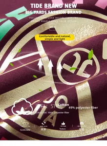 Detailed fabric texture of maroon sweatshirt with 51% cotton and gold leaf print