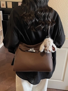 Deep brown litchi pattern leather tote bag with silver buckle and plush bunny charm