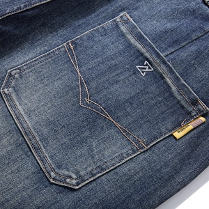 Men's loose fit elastic waist joggers with rear pocket detail and yellow brand label